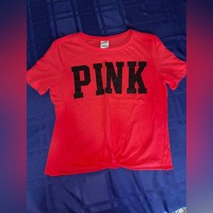 PINK short sleeve shirt. Size Medium. Selling for $